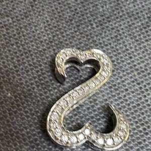 Jane Seymour’s Open heart pendant 14kt white gold diamond